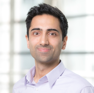 Headshot of Dr Kartik Kumar smiling