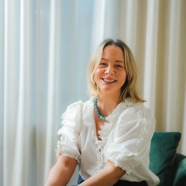 Square headshot image of Dr Alanna Hare smiling